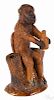 Pennsylvania redware monkey man and jug match holder, 19th c., 6 1/2'' h.