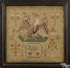 Silk on linen sampler, dated 1827, wrought by Rhoda Bindley, with a large spread winged eagle