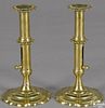 Pair of George II brass push-up candlesticks, ca. 1760, with petal bases, 7 1/2'' h.