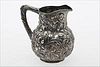 3753448: S. Kirk & Son Co. Sterling Silver Repousse Water
 Pitcher, C. 1896-1924 E3RDQ