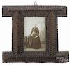 Tramp art carved frame, ca. 1900, with five tightly carved tiers, 5 3/4'' x 6 1/2''.