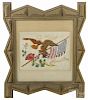 Tramp art carved and painted frame, ca. 1900, with a needlework panel