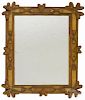 Tramp art carved mirror, ca. 1900, with applied hearts, overall - 28 1/2'' x 22 1/2''.