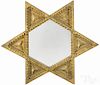 Tramp art carved and painted star mirror, ca. 1900, retaining an old gilt surface, 27 1/2'' h.