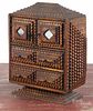 Tramp art carved cabinet, ca. 1900, with two mirrored doors over two drawers, 11 1/2'' h., 11'' w.