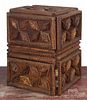Tramp art carved cabinet, ca. 1900, having a single drawer over a single door, 13'' h., 10'' w.
