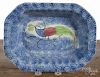 Blue spatter peafowl serving dish, 19th c., 10 1/4'' l., 7 3/4'' w.