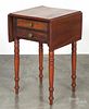 Pennsylvania Sheraton walnut and cherry two-drawer stand, 19th c., with drop leaves, 29'' h., 18'' w.