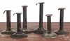 Six tin hogscaper candlesticks, 19th c., one inscribed Heist, tallest - 7''.