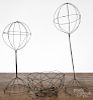 Two wire hat stands, ca. 1900, 21'' h. and 17'' h., together with a hanging wire basket, 4 1/2'' h.
