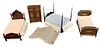 Lot of 4 pieces miniature dollhouse furniture in different wood tones. Made out of wood and plastic with some items made by BESPAQ. The canopy for the