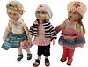 Lot of 3 cute Kish & Co hard vinyl dolls @ approx 8" tall. Dolls are five-jointed and doll in blue skirt retains her paper manufacturer tag. All have 