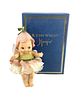 R. John Wright darling Kewpie themed doll titled "Fleur." DollÃ­s original hangtag included which identifies item as #049/250, doll is 6" tall and is 
