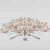 Set of Twelve Silver Plate Nut Dishes and a Set of Seven Demitasse Spoons