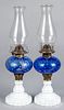 Pair of blue opalescent oil lamps, 19th c.