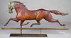 Swell bodied running horse weathervane, 20th c.