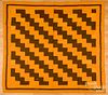 Orange and brown pieced quilt, early 20th c.