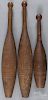 Three Indian clubs, late 19th c., 26'' h. and 19 3/4'' h.