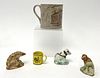Three Ceramic Figures and Advertising Mug