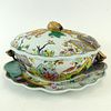 Vintage Mottahedeh Tobacco Leaf Large Covered Tureen with underplate and fruit finial. Signed. Good condition. Tureen measures 6" H x 14-1/2" W. Shipp