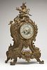 A French gilt-bronze Louis XV-style mantel clock