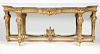 A Louis XIV-style carved giltwood console table