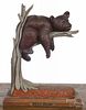 Contemporary carved bear on a tree limb, by Robert Brodeski, titled Billy Bear, 14 1/2'' h.