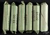 Three hundred assorted silver dimes, rolled, average circulated.