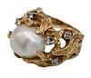 14 Karat Gold Ring, set with pearl and diamond accents, with appraisal, size 6, 12.1 grams.