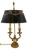 Small French Double Boulette Lamp, having tole black painted shade on scrolling acanthus gilt bronze base with hoof feet, height 24 inches.