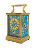 A French Brass and Champleve Carriage Clock Height over handles 6 7/8 inches.
