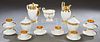 French Twenty-Two Piece Porcelain Coffee Set, 20th c., with gilt decoration, consisting of a coffee pot, teapot, water jar, 2 covered sugars, a waste 
