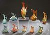 Group of Ten Pieces of Roseville Pottery, consisting of 617-10, Gardenia pitcher; 216-8, Wincraft Ewer;  981-6, Cosmos Ewer; 825-15 Thornapple Ewer;  