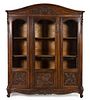 * A Louis XV Provincial Style Walnut Bibliotheque Height 100 x width 79 x depth 19 inches.
