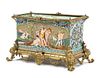 A Continental Gilt Bronze Mounted Faience Jardiniere Width 25 inches.
