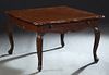 Louis XV Style Carved Mahogany Coffee Table, 20th c., the shaped stepped cookie corner top over a wide scalloped skirt with one long drawer, on cabrio