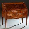 French Louis XVI Style Ormolu Mounted Inlaid Mahogany Slant Front Desk, early 20th c., the rectangular top over a slant lid with an inset gilt tooled 