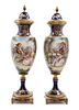 A Pair of Sevres Style Porcelain Urns Height 14 1/2 inches.