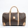 Celine Weekender Duffle Bag, in brown macadam coated canvas with golden hardware, opening to a brown canvas interior with a side zip closure storage p