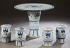 Chinese Five Piece Porcelain Patio Set, 20th c., consisting of a circular table with bird and bamboo decoration and four cylindrical stools, H.- 28 3/