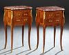 Pair of French Louis XV Style Carved Cherry Bowfront Marble Top Nightstands, 20th c., the stepped canted corner highly figured violette marble over a 