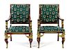 A Pair of Empire Style Gilt Bronze Mounted Mahogany Fauteuils Height 40 1/2 inches.