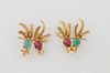 Pair of 18K Yellow Gold Bird Brooches, 20th c., each with a cabochon round 7mm emerald and ruby bird on a branch, H.- 1 5/16 in., W.- 1 3/8 in., D.- 3