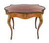 A Napoleon III Gilt Bronze Mounted Marquetry Center Table Height 30 3/4 x width 40 1/4 x depth 26 1/2 inches.