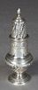 Sterling Sugar Shaker, London, 1888, by Charles Stuart Harris, fully hallmarked, with repousse decoration on a knopped circular base, H.- 8 1/2 in., D