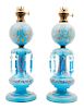 * A Pair of French Enameled Opaline Glass Oil Lamps Height overall 27 inches.