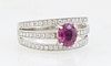 Lady's Platinum Dinner Ring, with a 1.08 carat oval ruby atop a triple split diamond mounted band, total diamond wt.- .51 cts., Size 7, with appraisal