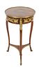 A Louis XV Style Gilt Bronze Mounted Marquetry Gueridon Height 31 inches.