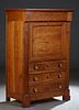 French Empire Style Carved Cherry Secretary Abattant, 19th c., the stepped rectangular top over a frieze drawer above a drop front secretary drawer wi