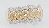 Lady's 18k White Gold Dinner Ring, the wide top with a central row of 9 vertical pear shaped yellow diamonds, bordered on both sides by a scalloped fr